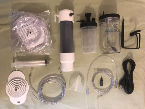 AquaCure AC50 hydrogen generator unit, front view showing digital display and tower